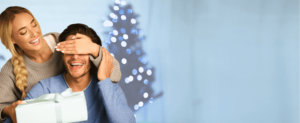 image of holiday couple covering lasik eyes